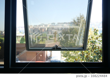 open black plastic pvc window at home. open black plastic pvc window at home. 108224484