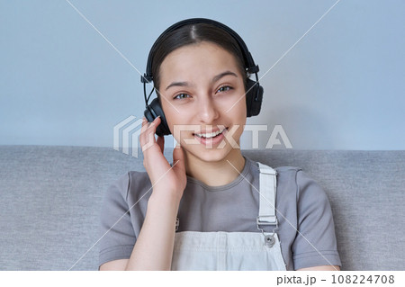 Webcam view of teenage girl student looking and talking to camera Webcam view of teenage girl student looking and talking to camera 108224708