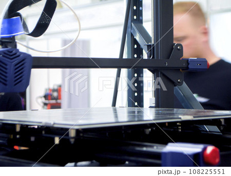 3D printer. Working surface desktop of 3D printer. Empty work surface of non-working 3D printer. Housing, print head printer. Additive progressive technology. Modern new printing industry 108225551