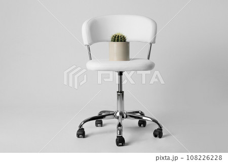 Chair with cactus isolated on white. Hemorrhoids concept 108226228