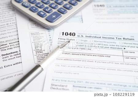 Tax form 1040 U.S. Individual Income Tax Return, business finance concept. Tax form 1040 U.S. Individual Income Tax Return, business finance concept. 108229119