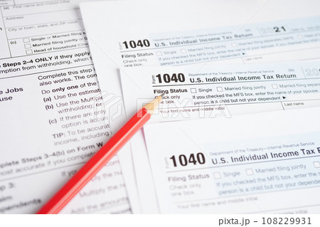 Tax form 1040 U.S. Individual Income Tax Return, business finance concept. Tax form 1040 U.S. Individual Income Tax Return, business finance concept. 108229931
