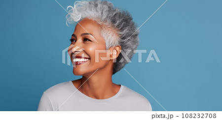 Middle-aged woman with a short gray hairdo looking at camera. Middle-aged woman with a short gray hairdo looking at camera. 108232708