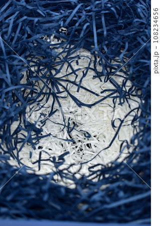 blue and white paper filler on carton cardboard box, texture background for design 108234656