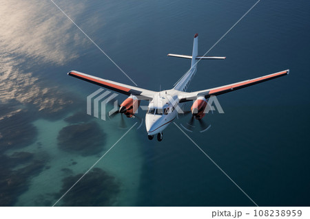 Twin-Engine Propeller Aircraft Over Water 108238959