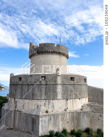 Ancient stone tower of Minceta against the sky. Dubrovnik, Croatia Ancient stone tower of Minceta against the sky. Dubrovnik, Croatia 108239049