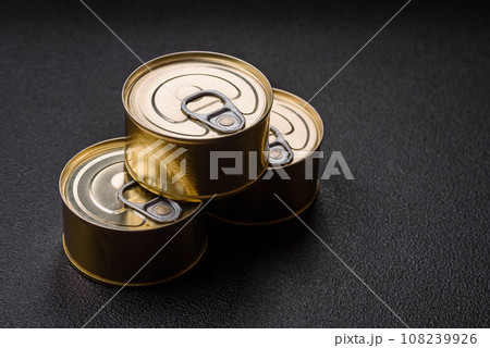 Round metal can with canned fish or meat with a key Round metal can with canned fish or meat with a key 108239926