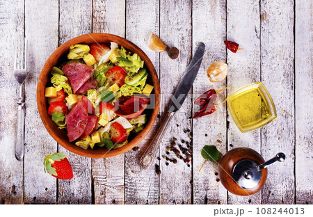 Iberian Ham, Strawberries and vegetables. Restaurant menu, dieting, cookbook recipe top view. 108244013