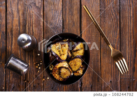 fried egg plant with Chinese chili sauce bowl 108244702