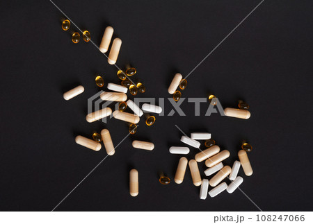 Weight Loss Pills and Measuring Tape, Diet Supplements Capsules, Obesity Lose Tablets, Color Drugs Pile 108247066
