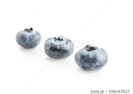 Three big blueberries isolated on white background Three big blueberries isolated on white background 108247627