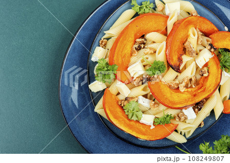Pasta with pumpkin, autumn meal. 108249807