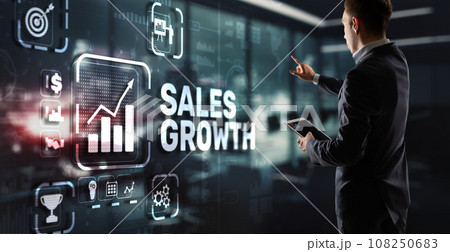 Sales Growth Man clicks inscription on virtual 3D screen 108250683