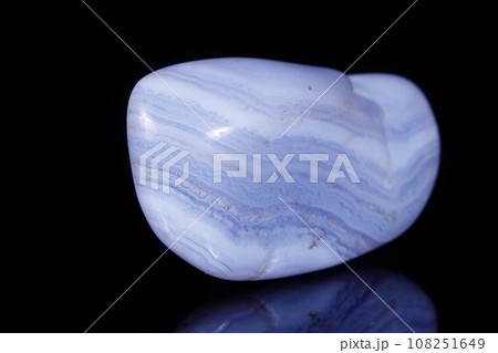 Macro mineral blue agate sapphirin in the rock on black background 108251649