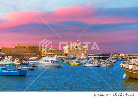 Citadel of Qaitbay, famous fort in the Mediterranean harbour of Alexandria, beautiful sunset view, Egypt Citadel of Qaitbay, famous fort in the Mediterranean harbour of Alexandria, beautiful sunset view, Egypt 108254613