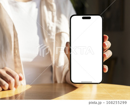 Berlin, Germany October 20 2023 Hand holding, mobile phone screen mock up, iphone mockup Berlin, Germany October 20 2023 Hand holding, mobile phone screen mock up, iphone mockup 108255299