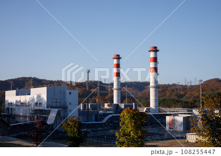 Power plant with two red and white pipes Power plant with two red and white pipes 108255447
