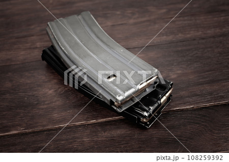 Ammunition with magazine on wooden table 108259392