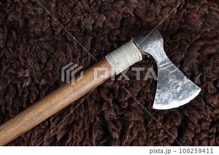 battle axe on sheep fur battle axe on sheep fur 108259411