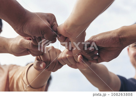 Close up hands Teamwork group of multi racial people meeting join hands. Diversity people hands join empower partnership teams connect volunteer community. Diverse multiethnic Partners team together 108263808