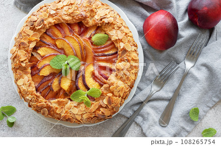 Homemade  galette with peaches. 108265754