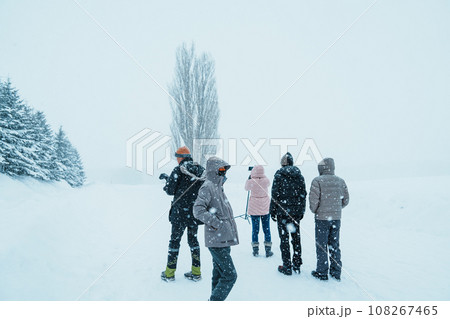 tourist Visiting in Biei, Traveler in Sweater sightseeing Tree of Ken and Marry with Snow in winter season. landmark and popular for attractions in Hokkaido, Japan. Travel and Vacation concept tourist Visiting in Biei, Traveler in Sweater sightseeing Tree of Ken and Marry with Snow in winter season. landmark and popular for attractions in Hokkaido, Japan. Travel and Vacation concept 108267465