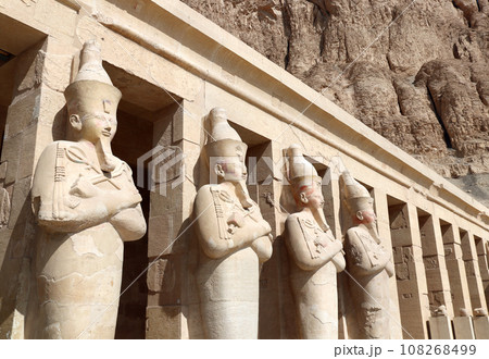 Statues of Queen Hatshepsut at entrance of Deir el-Bahari (Deir el-Bahri) the Mortuary Temple of Hatshepsut  in Valley of the Kings, Western Thebes, Luxor, Egypt 108268499
