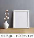 Frame and poster mock up in living room with coton branch in clay vase. Scandinavian interior. 108269156