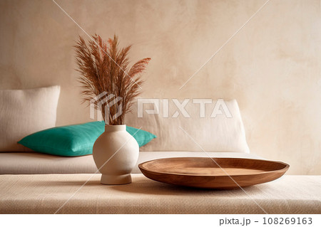 Beige ceramic vases with dried flowers. Stylish and minimalistic background for display your products in living room. Scandinavian interior. Modern home decor. Copy space. Beige ceramic vases with dried flowers. Stylish and minimalistic background for display your products in living room. Scandinavian interior. Modern home decor. Copy space. 108269163