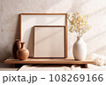 Frame and poster mock up in living room with clay vase and dried flowers. Scandinavian interior. 108269166