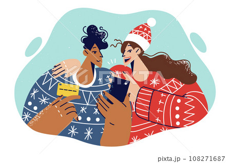 Man and woman are doing christmas online shopping and paying for purchases on phone with bank card 108271687