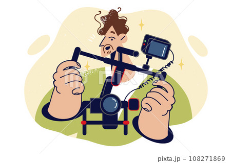 Man videographer holds camera mounted on stabilizer to shoot video with smooth frame movement 108271869