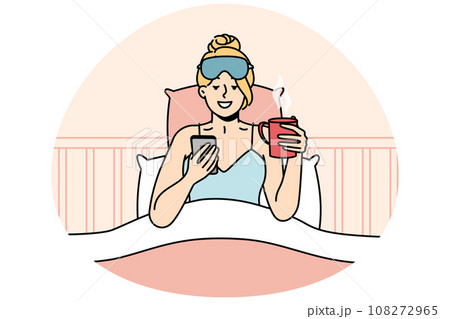 Awakened woman chats on cellphone, drinks coffee. Awakened woman chats on cellphone, drinks coffee. 108272965