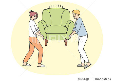 Man, woman install heavy armchair after moving. 108273073