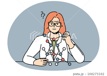 Woman scientist sitting at desk, looks at molecule model. 108273102