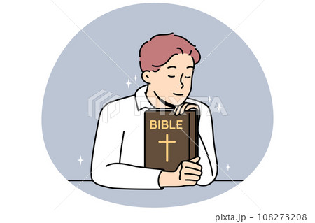 Man Christian holds Bible, prays to God, feels grace. Man Christian holds Bible, prays to God, feels grace. 108273208
