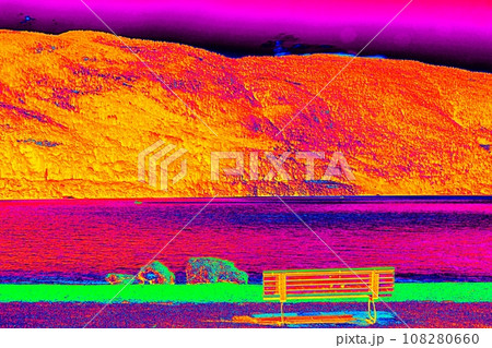 Lake between mountain and the bench at the bank. Ultraviolet view 108280660