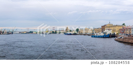 cityscape of the historical center of Saint Petersburg, view of the Lieutenant Schmidt embankment from the Annunciation Bridge over the Neva River cityscape of the historical center of Saint Petersburg, view of the Lieutenant Schmidt embankment from the Annunciation Bridge over the Neva River 108284558