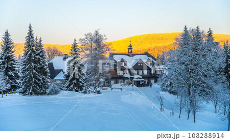 Cross-country skiing on winter evening. Samalova Hut on Nova louka in Jizera Mountains, Czech Republic 108288914