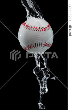 Baseball ball hit water and splash in air. Baseball ball fly in rain and splatter splash in droplet water. Black background isolated freeze action Baseball ball hit water and splash in air. Baseball ball fly in rain and splatter splash in droplet water. Black background isolated freeze action 108292938