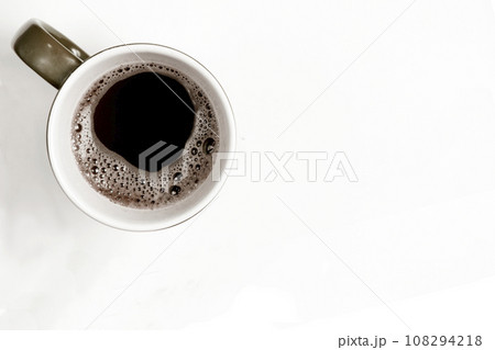 Hot coffee in cup on white background. top view. 108294218