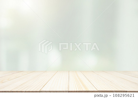 Empty wood table top with blur window curtain background for product display Empty wood table top with blur window curtain background for product display 108295621