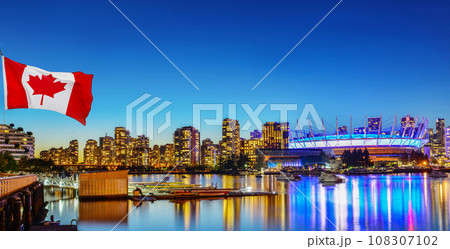 Canadian flag in front of view in Vancouver Downtown,British Columbia, Canada 108307102