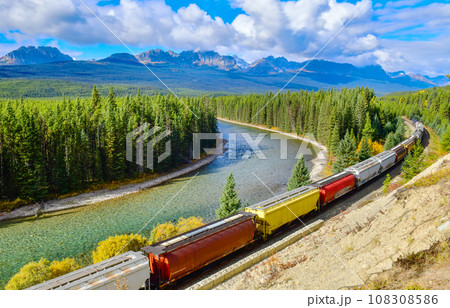 Train passing famous Morant's curve at Bow Valley in autumn ,Banff National Park, Canadian Rockies,Canada. Train passing famous Morant's curve at Bow Valley in autumn ,Banff National Park, Canadian Rockies,Canada. 108308586