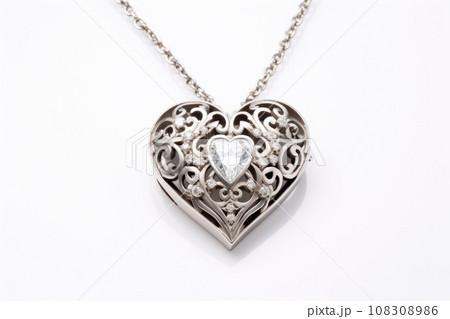 Silver necklace in the shape of heart on white background Silver necklace in the shape of heart on white background 108308986
