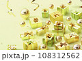 キラキラ輝くグリーンとゴールドのプレゼント背景 108312562