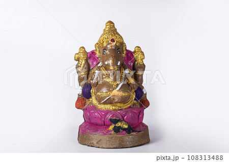 Ganesh idol made of clay on white background. Ganesh idol made of clay on white background. 108313488
