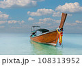 Thai traditional wooden longtail boat and beautiful sand Railay Beach in Krabi province, Thailand. 108313952