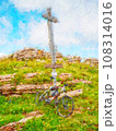 Mountain bike at wooden tourist sign on mountain trail from Alps mountain . 108314016