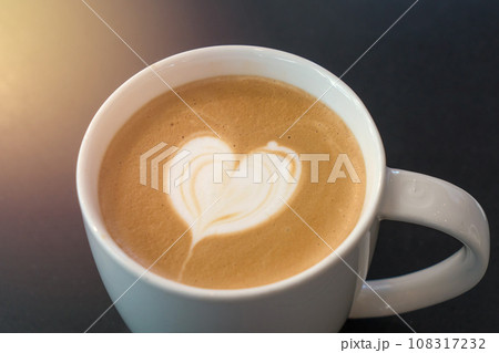Latte coffee art or cappuccino coffee on table 108317232